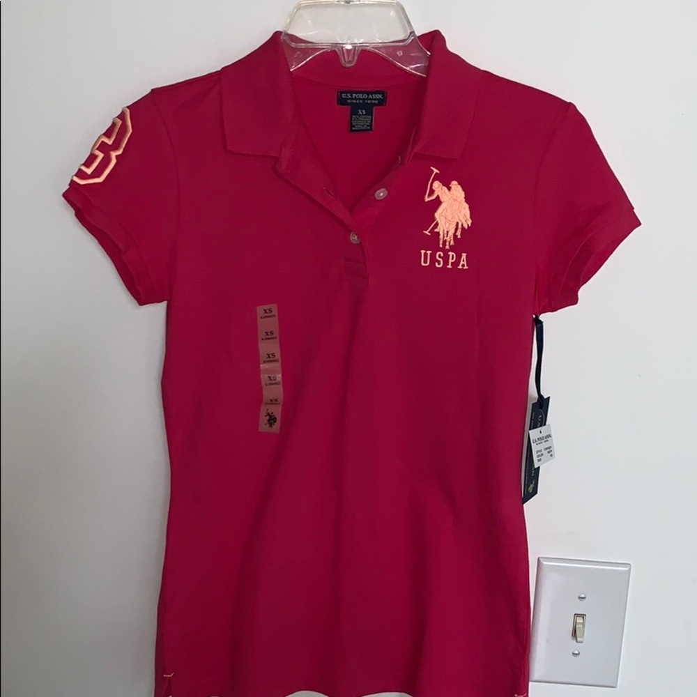 NWT Ladies polo shirt. Size XS. HOT PINK